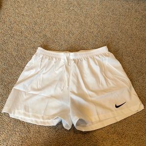 White Nike shorts